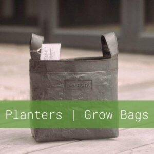 Recycled plastic planters and fabric grow bags are environmentally friendly options.