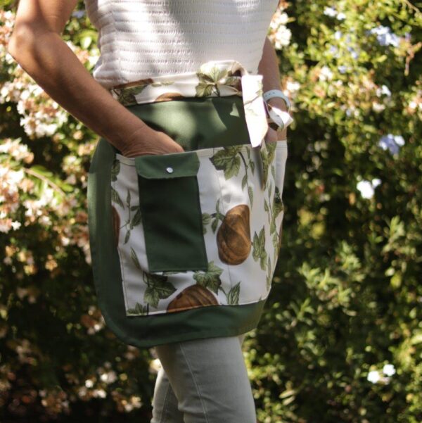 Gardening Apron with small pocket for cell phones.
